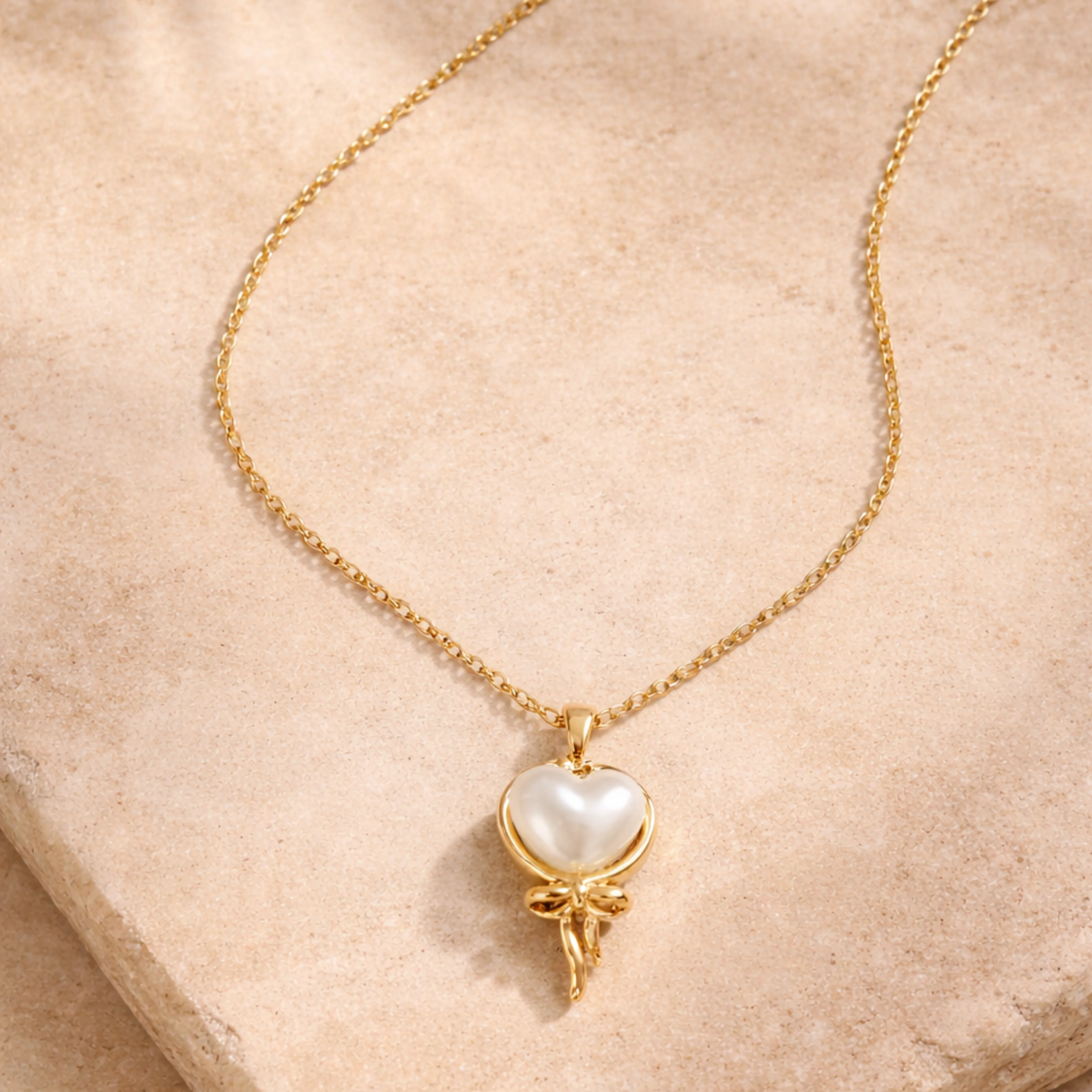 Delicate gold necklace with pearl heart - Image 3