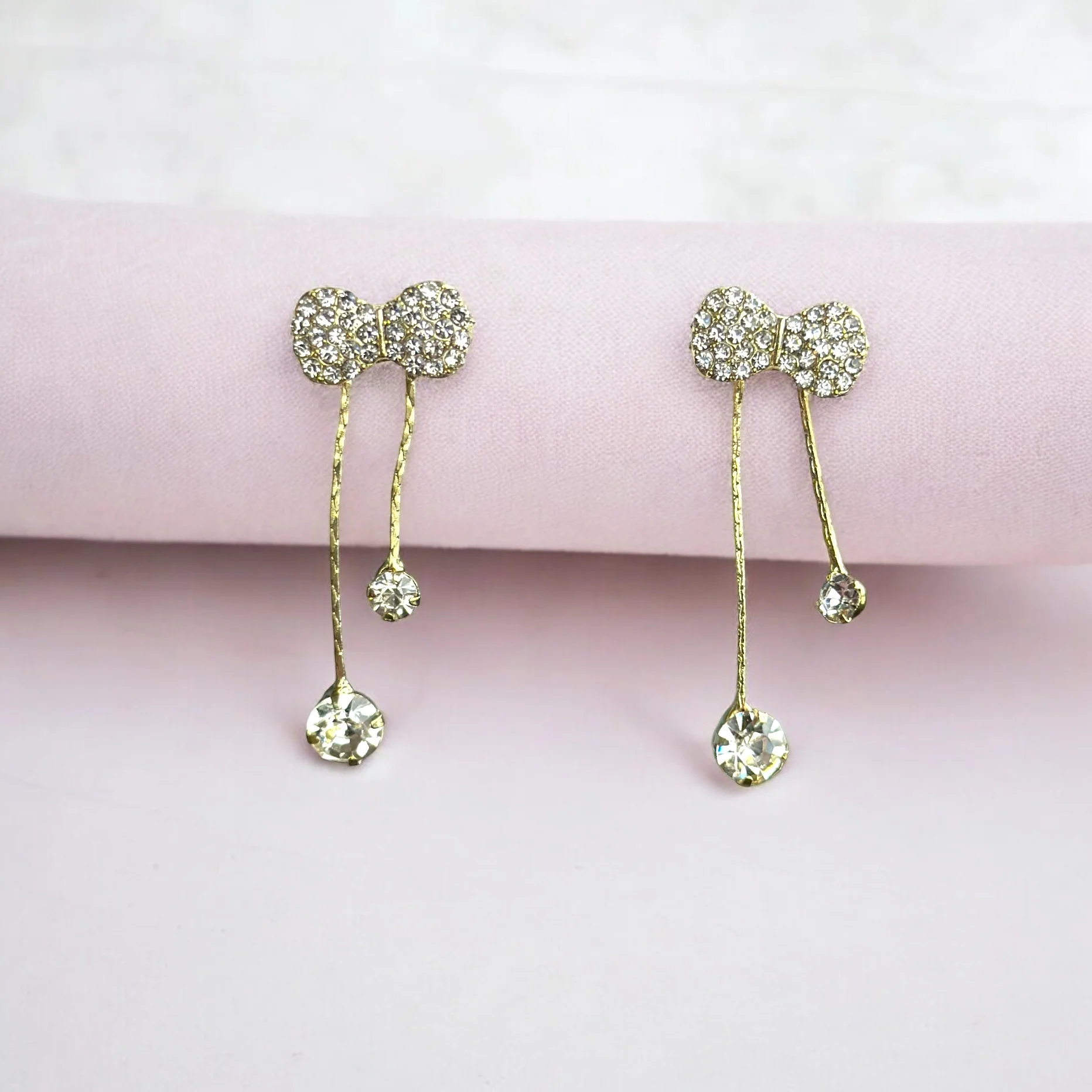 Luminous Silver Bow Drop Earring - Image 3