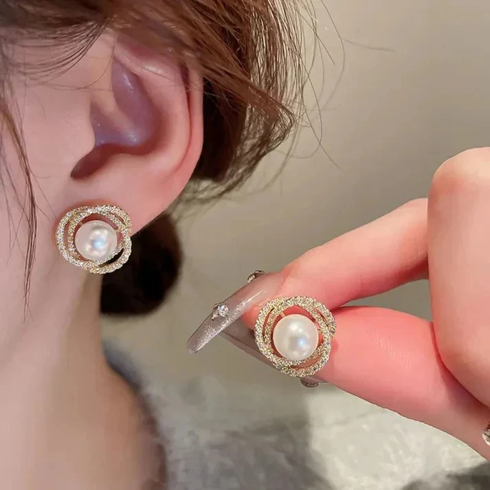 Pearl Glow Stud Earrings - Image 2